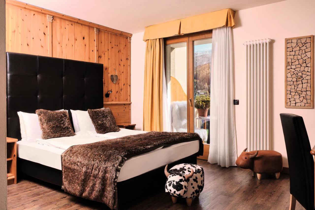 Boutique Hotel E Chalets Salvadori Mezzana  Quarto foto